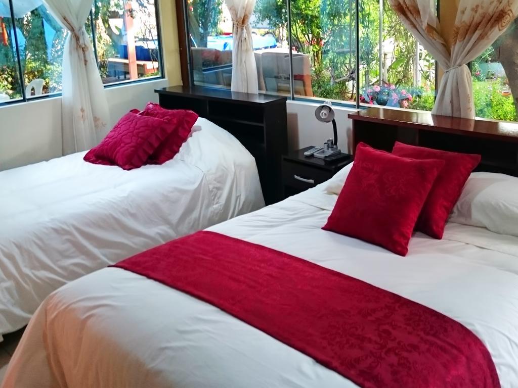Hostal El Parque Tababela Buitenkant foto