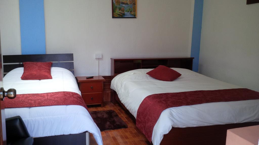 Hostal El Parque Tababela Kamer foto
