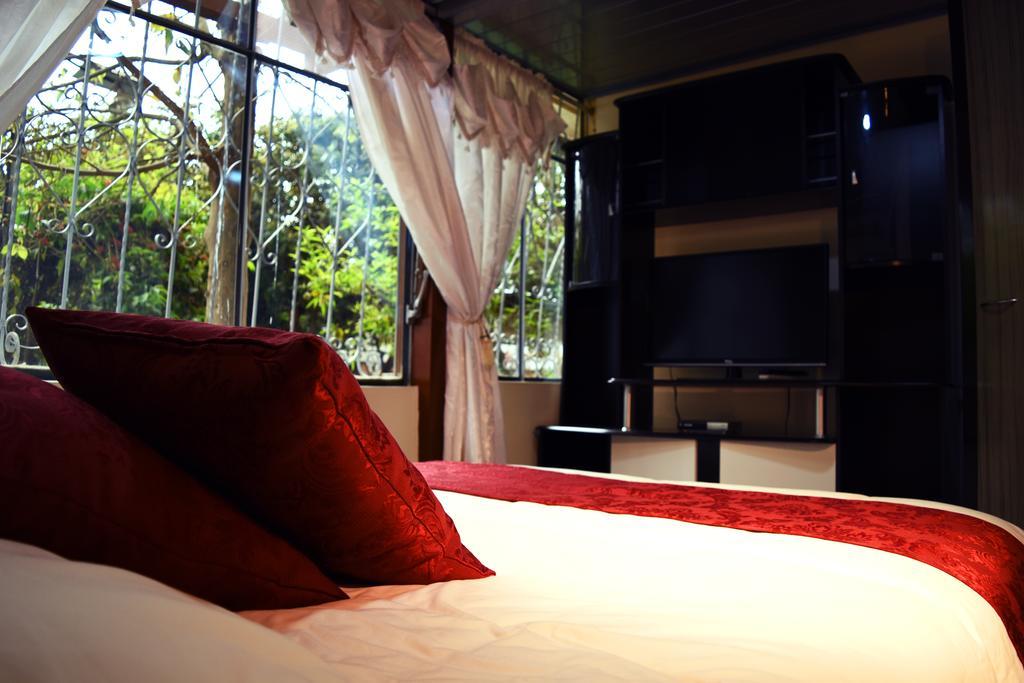 Hostal El Parque Tababela Kamer foto